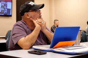 Stark student praying during class